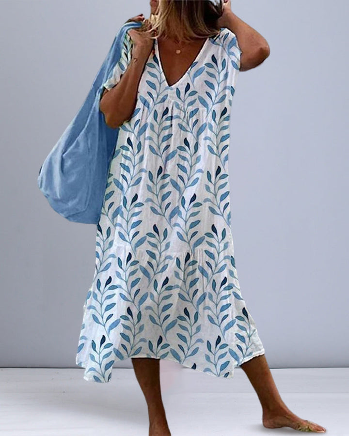 Vestido midi de moda con estampado de hojas y escote en V – Nea