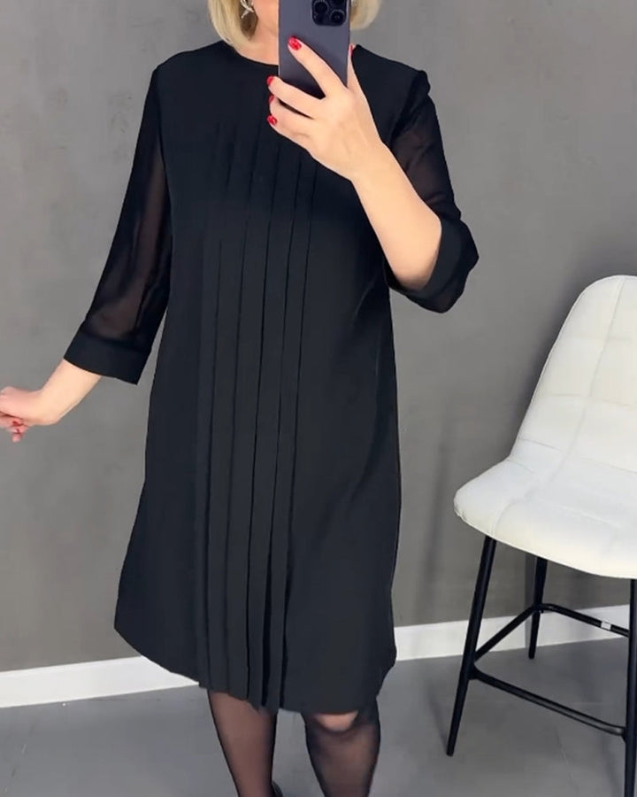 Elegant skiftkjole med mesh-detaljer – Gabrielle