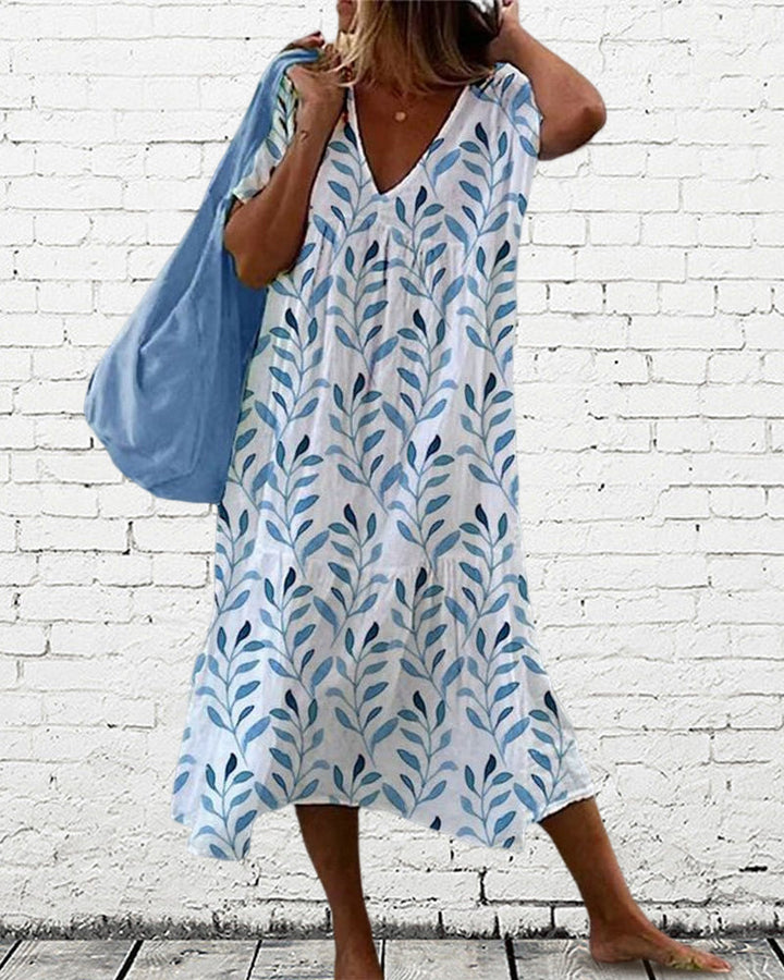 Vestido midi de moda con estampado de hojas y escote en V – Nea
