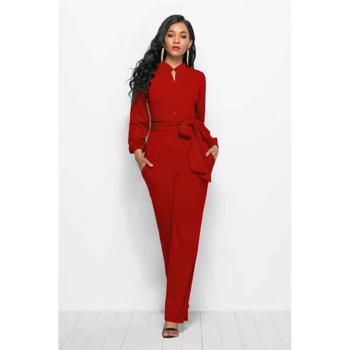 Vidt utsvingt jumpsuit med belte og V-hals – Elise