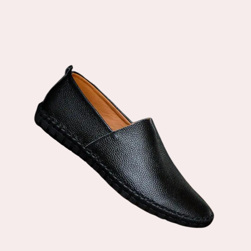 Schwarzer Lederschuh für Herren, eleganter Slipper, rutschfeste Sohle, modisch und bequem.