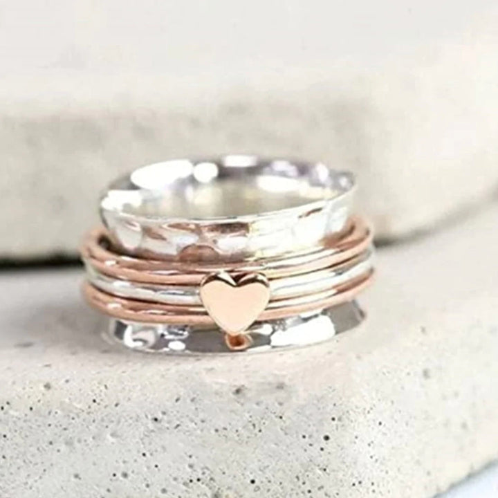 Anillo de corazón giratorio – Amara
