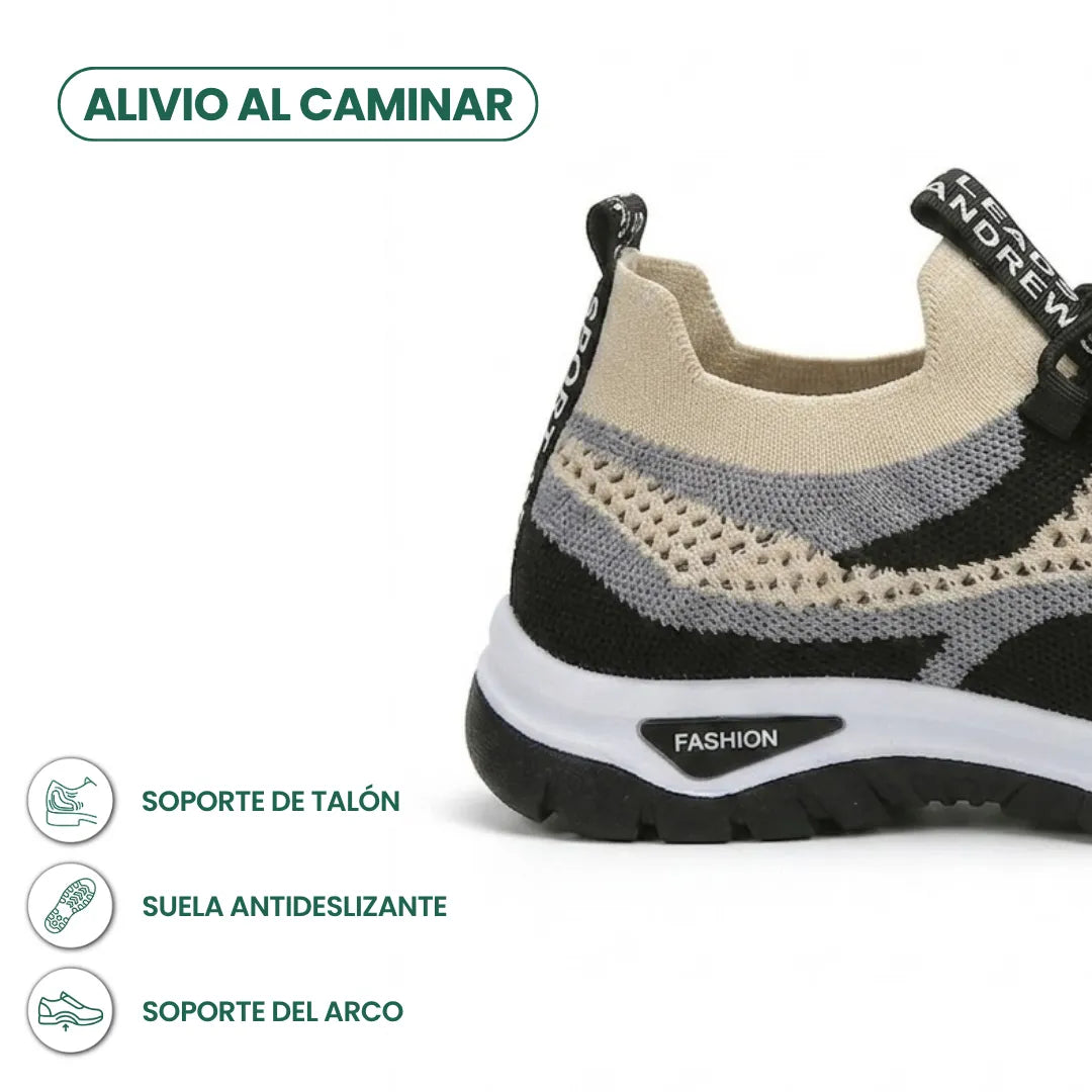 Fersenansicht des beige-schwarzen Mesh-Sneakers mit grauen Streifen und schwarzer Sohle, daneben Symbole für Fersenhalt, rutschfeste Sohle und Fußgewölbestütze. 40
