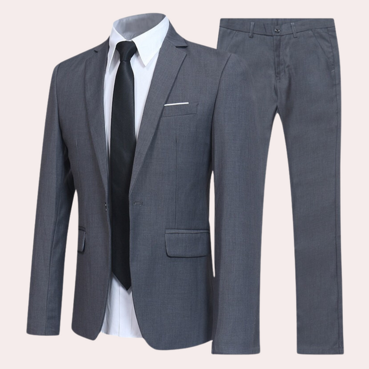 Grauer Herrenanzug mit Krawatte, elegantes Business-Outfit, klassischer Stil, hochwertige Verarbeitung.