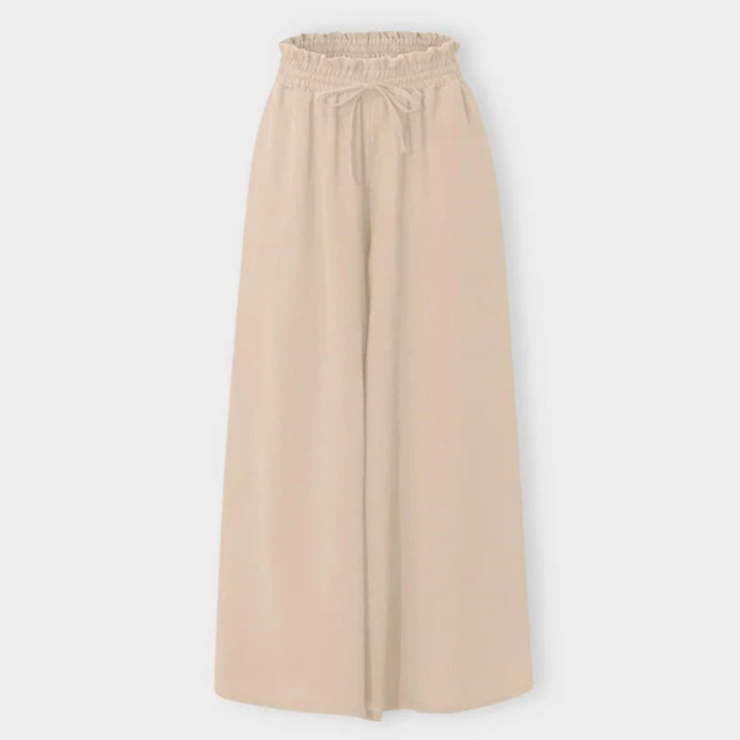 Beige Damenhose, weites Bein, elastischer Bund, modisch, bequem, ideal für Freizeitkleidung.