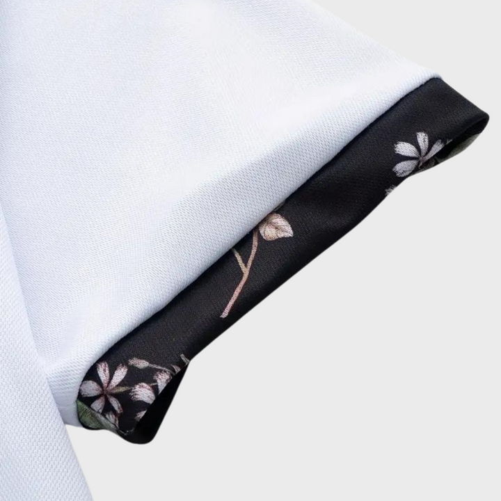 Weiße Herren-Poloshirt-Ärmel mit floralem Muster, Baumwolle, stilvoll, elegant.