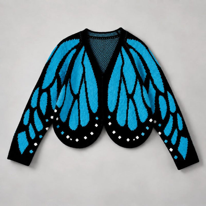 Flach ausgelegte Strickjacke mit türkisblauem Flügelmuster auf schwarzem Grund, vorne offen mit V-Ausschnitt 1