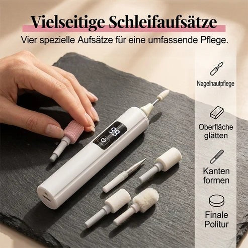 Hand wechselt auf dunkler Schieferplatte einen rosa Aufsatz, daneben liegen weitere Schleifköpfe und das Gerät 3