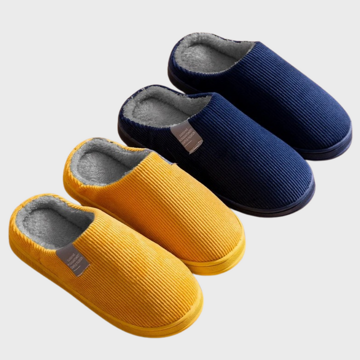 Gelbe und blaue Hausschuhe aus Cord mit weichem Innenfutter, ideal für Komfort und Wärme.
