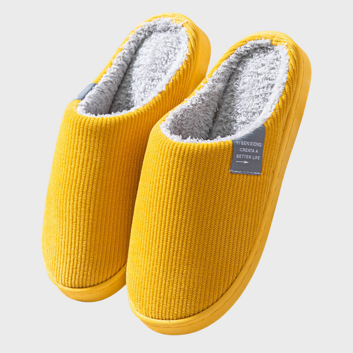 Gelbe Hausschuhe aus Cord mit weichem Futter, rutschfeste Sohle, gemütlich und warm.