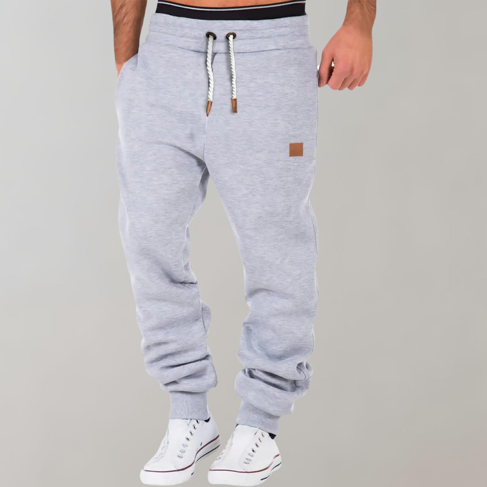 Graue Herren-Jogginghose mit Kordelzug, bequem, sportlich, Baumwolle, Freizeitmode.