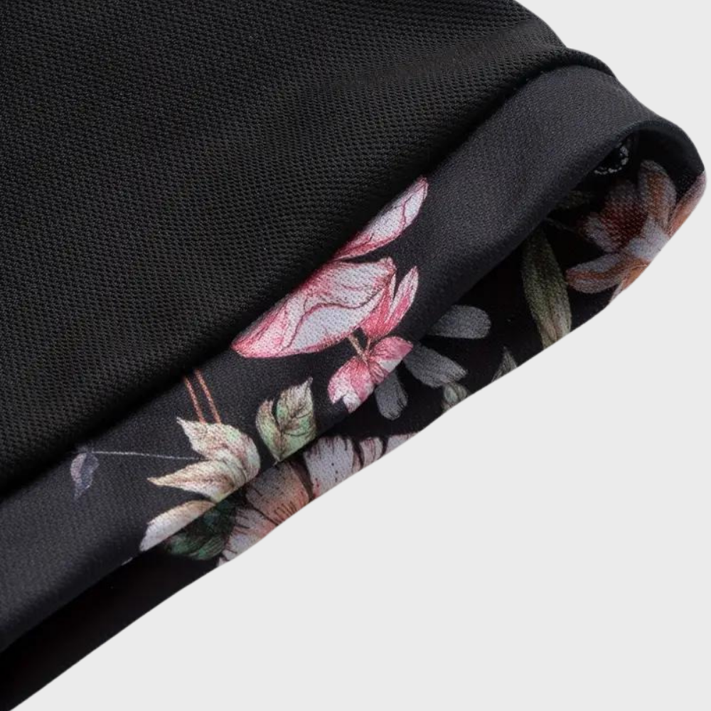 Schwarzes Polohemd mit Blumenmuster, Baumwolle, kurzärmelig, modisch, Herrenbekleidung.